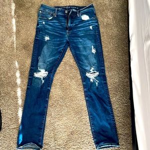 Selling dark blue American eagle ripped jeans, slim straight, 34x32 size